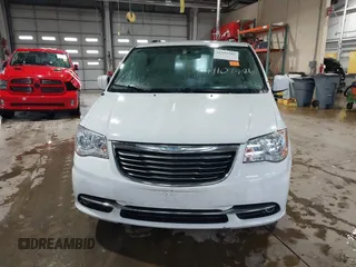 2015 Chrysler Town & Country Touring with VIN 2C4RC1BG0FR628721, listed as a IAAI auction lot 41101486 with 125,942 mi miles. Bid and sale history available at carsss.com. Image 12.