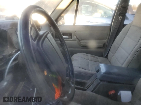 1996 Jeep Cherokee Sport with VIN 1J4FJ68S8TL244251, listed as a Copart auction lot 42321635 with 168,354 mi miles and Salvage Title. Bid and sale history available at carsss.com. Image 7.