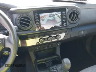 2022 Toyota Tacoma SR with VIN 3TYRX5GN1NT036760, listed as a IAAI auction lot 40435091 with 50,107 mi miles and . Bid and sale history available at DreamBid. Image 19.