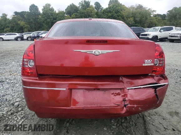 2009 Chrysler 300 Touring with VIN 2C3KA53V99H617274, listed as a Copart auction lot 71791144 with 123,045 mi miles and Salvage Title. Bid and sale history available at carsss.com. Image 6.