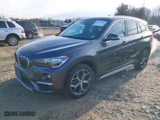 2018 BMW X1 xDrive28i with VIN WBXHT3C33J5F90349, listed as a IAAI auction lot 41385063 with 55,994 mi miles. Bid and sale history available at carsss.com. Image 18.