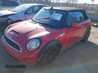 2013 MINI Convertible S with VIN WMWZP3C55DT705938, listed as a IAAI auction lot 41372294 with 118,481 mi miles and . Bid and sale history available at DreamBid. Image 2.