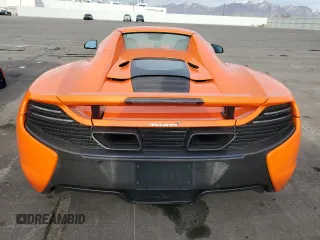 2015 McLaren 650S z VIN SBM11FAA8FW004578, wystawiony jako Copart lot #82216824 z przebiegiem 19 372 mil mil oraz Szkody całkowita. Historia ofert i sprzedaży dostępna na DreamBid. Obrazek 6.