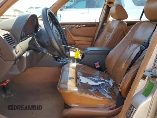 1995 Mercedes-Benz C with VIN WDBHA28E7SF255142, listed as a Copart auction lot 68411704 with 334,000 mi miles and Salvage Title. Bid and sale history available at carsss.com. Image 7.