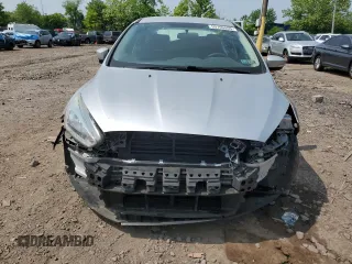 2017 Ford Focus SE with VIN 1FADP3F23HL304625, listed as a Copart auction lot 59760065 with 87,130 mi miles and Salvage title. Bid and sale history available at DreamBid. Image 5.