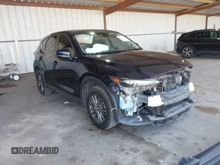 2020 Mazda CX-5 Touring z VIN JM3KFACM2L0802461, wystawiony jako IAAI lot #42148039 z przebiegiem 57 963 mil mil oraz . Historia ofert i sprzedaży dostępna na DreamBid. Obrazek 1.