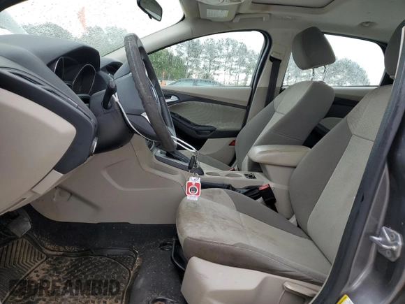 2014 Ford Focus SE with VIN 1FADP3F23EL359605, listed as a Copart auction lot 53696465 with 139,884 mi miles and Salvage Title. Bid and sale history available at DreamBid. Image 7.