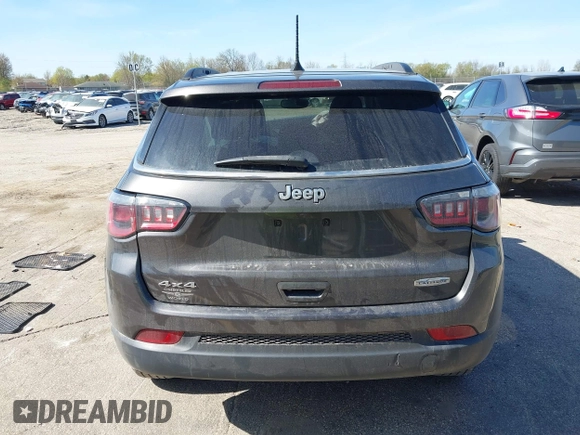 2018 Jeep Compass Altitude with VIN 3C4NJDBB6JT239565, listed as a IAAI auction lot 42219401 with 85,013 mi miles and . Bid and sale history available at DreamBid. Image 16.