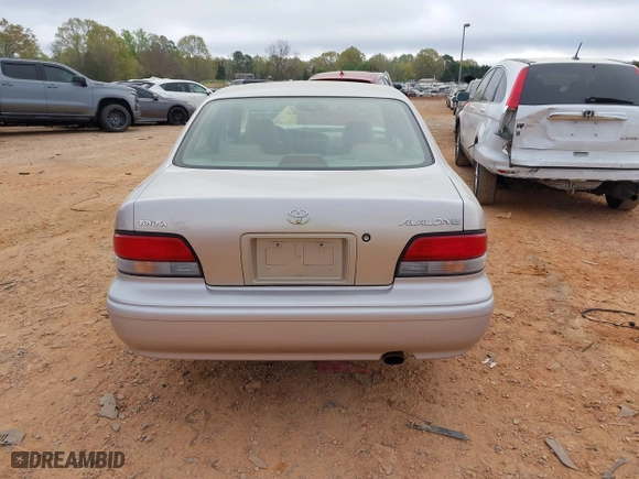 1997 Toyota Avalon XL with VIN 4T1BF12B1VU202935, listed as a IAAI auction lot 41900467 with 274,960 mi miles. Bid and sale history available at carsss.com. Image 16.