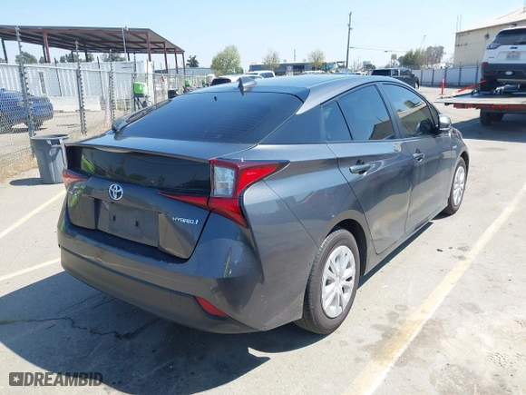 2022 Toyota Prius L Eco with VIN JTDKAMFU5N3160694, listed as a IAAI auction lot 41874909 with 80,376 mi miles. Bid and sale history available at carsss.com. Image 4.