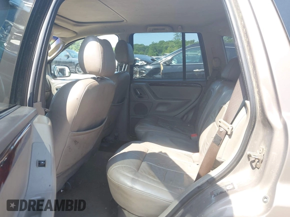 2002 Jeep Grand Cherokee Limited z VIN 1J8GW58N62C213751, wystawiony jako IAAI lot #42478869 z przebiegiem 233 848 mil mil oraz . Historia ofert i sprzedaży dostępna na DreamBid. Obrazek 8.