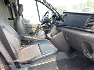 2022 Ford Transit z VIN 1FTYE2Y88NKA08465, wystawiony jako IAAI lot #42387552 z przebiegiem 90 951 mil mil oraz . Historia ofert i sprzedaży dostępna na DreamBid. Obrazek 5.