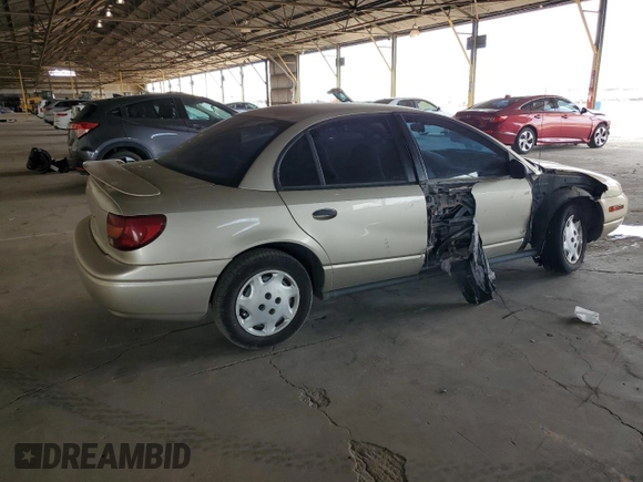 2002 Saturn SL z VIN 1G8ZH52842Z165459, wystawiony jako Copart lot #57273035 z przebiegiem 84 482 mil mil oraz Szkoda całkowita • Salvage title. Historia ofert i sprzedaży dostępna na DreamBid. Obrazek 3.