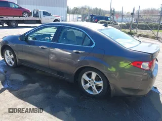 2009 Acura TSX with VIN JH4CU26659C027813, listed as a IAAI auction lot 41848415 with 216,257 mi miles. Bid and sale history available at carsss.com. Image 3.