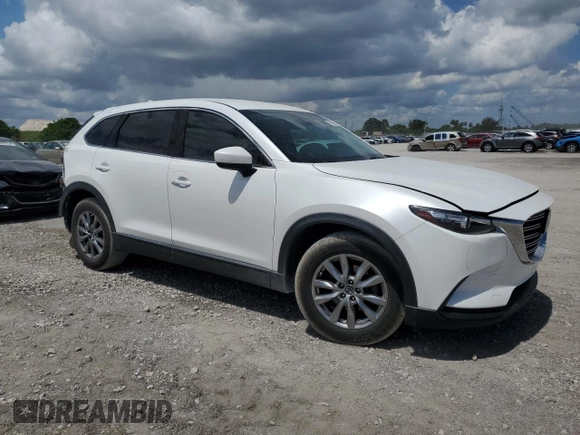 2019 Mazda CX-9 Touring with VIN JM3TCACY7K0327632, listed as a Copart auction lot 60798635 with 63,087 mi miles and Salvage title. Bid and sale history available at DreamBid. Image 4.