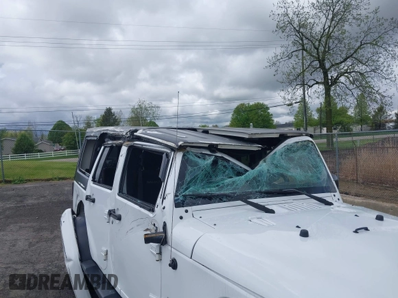 2016 Jeep Wrangler Unlimited Sahara with VIN 1C4BJWEG8GL129577, listed as a IAAI auction lot 42184373 with 185,761 mi miles and . Bid and sale history available at DreamBid. Image 6.