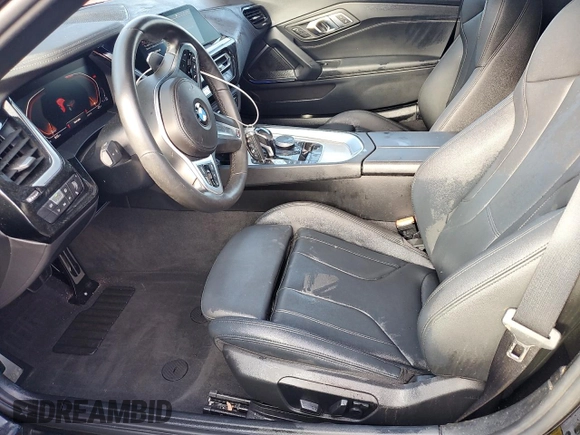 2020 BMW Z4 sDrive30i with VIN WBAHF3C06LWW75400, listed as a Copart auction lot 74297024 with 34,559 mi miles and Salvage Title. Bid and sale history available at carsss.com. Image 7.