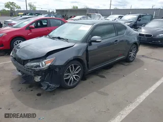 2015 Scion tC with VIN JTKJF5C73FJ008663, listed as a IAAI auction lot 41969395 with 125,758 mi miles. Bid and sale history available at carsss.com. Image 18.