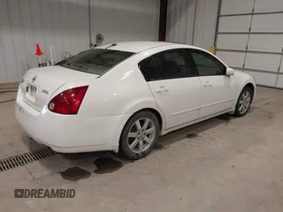 2005 Nissan Maxima SE z VIN 1N4BA41E55C816849, wystawiony jako IAAI lot #40978612 z przebiegiem 127 952 mil mil oraz . Historia ofert i sprzedaży dostępna na DreamBid. Obrazek 4.