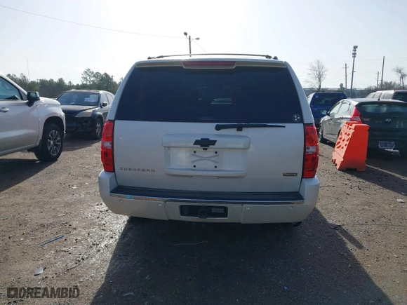 2011 Chevrolet Suburban LTZ with VIN 1GNSCKE02BR317269, listed as a IAAI auction lot 41446893 with 304,318 mi miles. Bid and sale history available at carsss.com. Image 16.