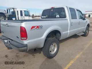 2004 Ford F-350 XL with VIN 1FTSW31P64EB19006, listed as a IAAI auction lot 41452911 with Not provided miles and . Bid and sale history available at DreamBid. Image 4.