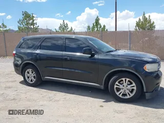 2012 Dodge Durango SXT with VIN 1C4RDJAG0CC206726, listed as a IAAI auction lot 42653653 with 243,337 mi miles and . Bid and sale history available at DreamBid. Image 13.