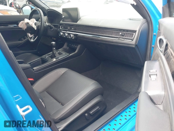 2024 Honda Civic Sport Touring z VIN 19XFL1G86RE029798, wystawiony jako IAAI lot #41469492 z przebiegiem 13 104 mil mil oraz . Historia ofert i sprzedaży dostępna na DreamBid. Obrazek 5.