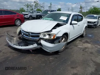 2012 Dodge Avenger SXT with VIN 1C3CDZCB5CN156288, listed as a IAAI auction lot 42115638 with 157,534 mi miles and . Bid and sale history available at DreamBid. Image 2.