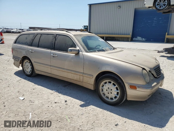 2003 Mercedes-Benz E-Class AWD with VIN WDBJH82J93X088042, listed as a Copart auction lot 70566864 with 167,374 mi miles and Salvage Title. Bid and sale history available at carsss.com. Image 4.