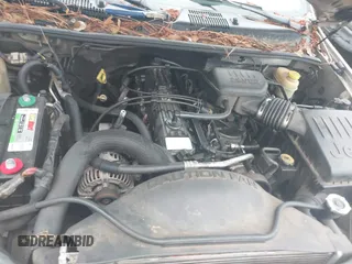 2003 Jeep Grand Cherokee Laredo z VIN 1J4GW48S33C599693, wystawiony jako IAAI lot #42228885 z przebiegiem 257 551 mil mil oraz . Historia ofert i sprzedaży dostępna na DreamBid. Obrazek 10.
