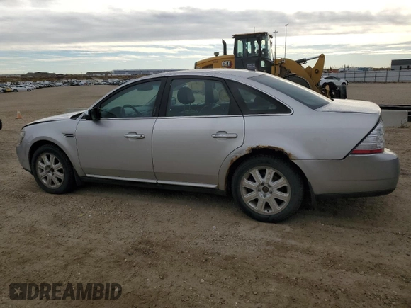 2008 Ford Taurus Limited with VIN 1FAHP28W18G110177, listed as a Copart auction lot 74903664 with 250,788 mi miles and Salvage title. Bid and sale history available at DreamBid. Image 2.