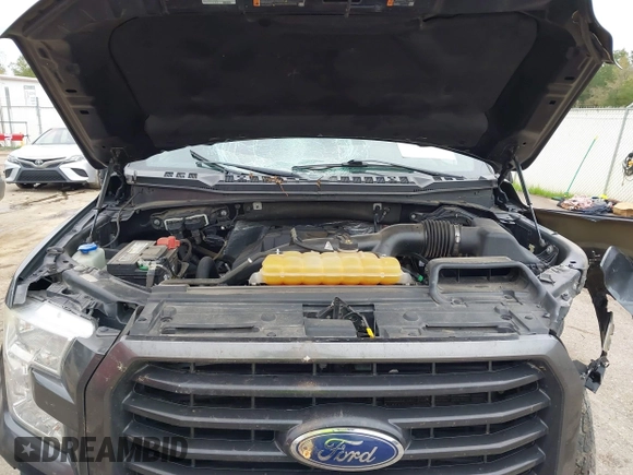 2015 Ford F-150 XLT with VIN 1FTEX1EP7FFA52955, listed as a IAAI auction lot 40799137 with 134,290 mi miles. Bid and sale history available at carsss.com. Image 10.