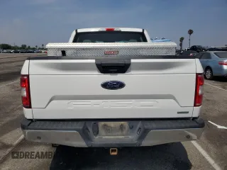 2019 Ford F-150 XL with VIN 1FTEW1E49KFB03911, listed as a Copart auction lot 60873085 with 143,134 mi miles and Clean title. Bid and sale history available at DreamBid. Image 6.