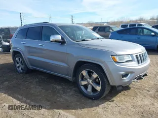 2014 Jeep Grand Cherokee Overland with VIN 1C4RJFCT8EC246264, listed as a IAAI auction lot 41692795 with 197,851 mi miles. Bid and sale history available at carsss.com. Image 1.