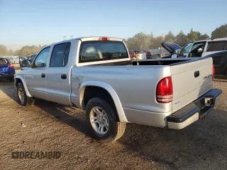 2004 Dodge Dakota Sport with VIN 1D7HL38N24S634602, listed as a Copart auction lot 74386034 with 158,855 mi miles and Salvage Title. Bid and sale history available at carsss.com. Image 2.