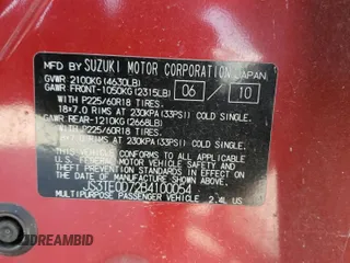 2011 Suzuki Grand Vitara Limited z VIN JS3TE0D72B4100054, wystawiony jako Copart lot #52535705 z przebiegiem 131 468 mil mil oraz Szkoda całkowita • Salvage title. Historia ofert i sprzedaży dostępna na DreamBid. Obrazek 13.