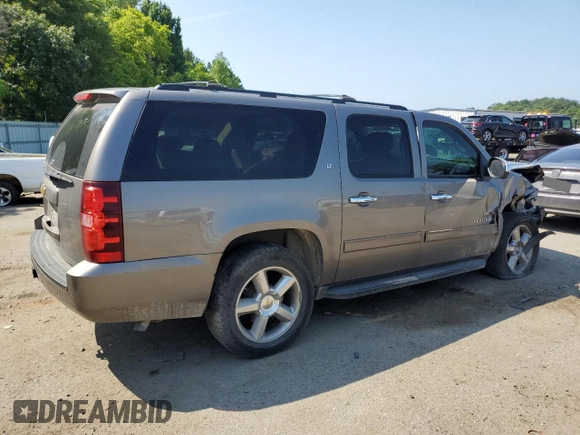 2013 Chevrolet Suburban LT with VIN 1GNSCJE07DR104489, listed as a Copart auction lot 60844784 with 185,420 mi miles and Salvage Title. Bid and sale history available at carsss.com. Image 3.
