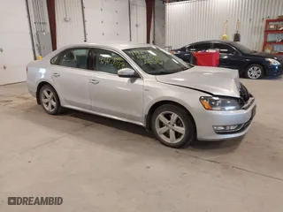 2015 Volkswagen Passat 1.8T Limited Edition with VIN 1VWAS7A31FC122516, listed as a IAAI auction lot 41410997 with 126,136 mi miles. Bid and sale history available at carsss.com. Image 1.