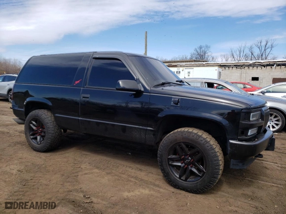 1996 Chevrolet Tahoe with VIN 3GNEK18R9TG158790, listed as a Copart auction lot 50576845 with 149,144 mi miles and Salvage Title. Bid and sale history available at carsss.com. Image 4.