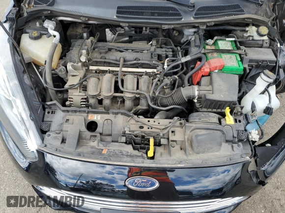 2017 Ford Fiesta SE z VIN 3FADP4BJ4HM122272, wystawiony jako Copart lot #49693695 z przebiegiem 55 151 mil mil oraz Szkoda całkowita • Salvage title. Historia ofert i sprzedaży dostępna na DreamBid. Obrazek 12.
