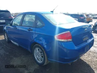 2011 Ford Focus SE with VIN 1FAHP3FN3BW201142, listed as a IAAI auction lot 41520289 with 244,506 mi miles. Bid and sale history available at carsss.com. Image 3.