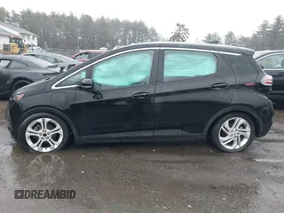 2023 Chevrolet Bolt EV 1LT with VIN 1G1FW6S02P4111699, listed as a IAAI auction lot 41943946 with 57,343 mi miles and . Bid and sale history available at DreamBid. Image 14.