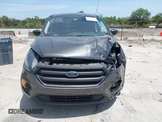 2018 Ford Escape S with VIN 1FMCU0F7XJUA16377, listed as a IAAI auction lot 42080136 with 81,060 mi miles and . Bid and sale history available at carsss.com. Image 13.