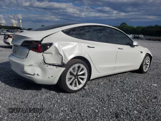 2023 Tesla Model 3 z VIN 5YJ3E1EA7PF573852, wystawiony jako Copart lot #57662565 z przebiegiem Nie podano mil oraz Szkoda całkowita • Salvage title. Historia ofert i sprzedaży dostępna na DreamBid. Obrazek 3.