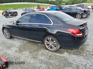 2016 Mercedes-Benz C 300 with VIN 55SWF4JB7GU129184, listed as a Copart auction lot 64310895 with 136,660 mi miles and Salvage title. Bid and sale history available at DreamBid. Image 2.