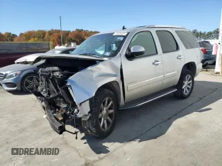 2011 GMC Yukon Denali with VIN 1GKS2EEF5BR338669, listed as a Copart auction lot 76604324 with 156,641 mi miles and Salvage Title. Bid and sale history available at carsss.com. Image 1.