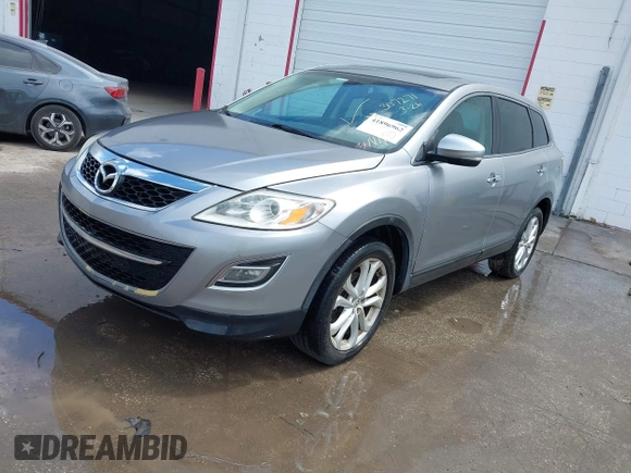 2011 Mazda CX-9 Grand Touring with VIN JM3TB2DA8B0307271, listed as a IAAI auction lot 41896962 with 144,624 mi miles and . Bid and sale history available at DreamBid. Image 2.