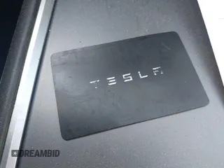 2022 Tesla Model 3 with VIN 5YJ3E1EA7NF103513, listed as a IAAI auction lot 41643592 with 35,631 mi miles and . Bid and sale history available at DreamBid. Image 11.