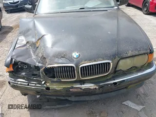 1999 BMW 7 Series 740il with VIN WBAGH8334XDP01166, listed as a IAAI auction lot 42073939 with 1 mi miles. Bid and sale history available at carsss.com. Image 6.