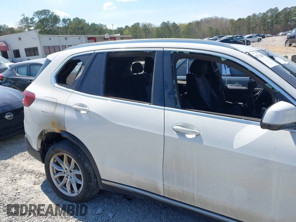 2020 BMW X5 sDrive40i with VIN 5UXCR4C08L9C07579, listed as a IAAI auction lot 41871208 with Not Provided miles and . Bid and sale history available at DreamBid. Image 13.